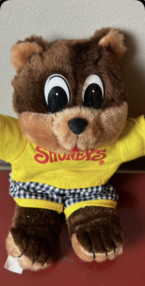 The loveable, squeezable and cuddle-able Shoney Bear® plush is
