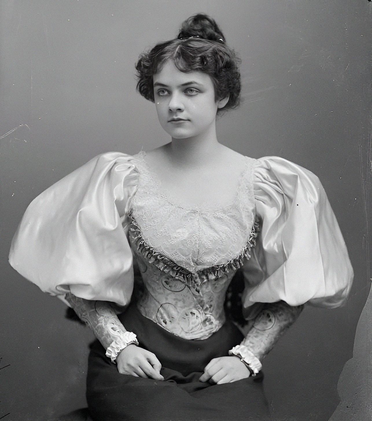 Bessie Brewer wears a fantastic shirt waist with puff sleeves 