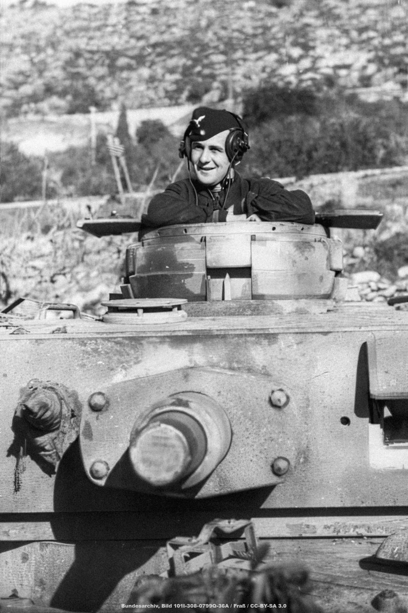 Tank soldier with headphones on a Panzer III (with the turret of a