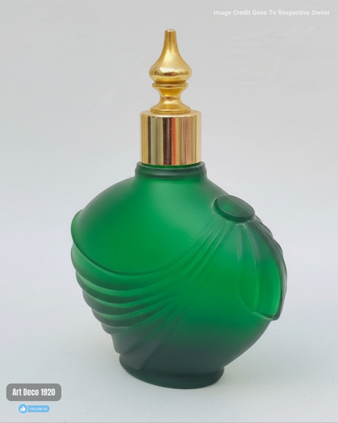 art-a-striking-green-art-deco-perfume-bottle-shaped-with-flowing