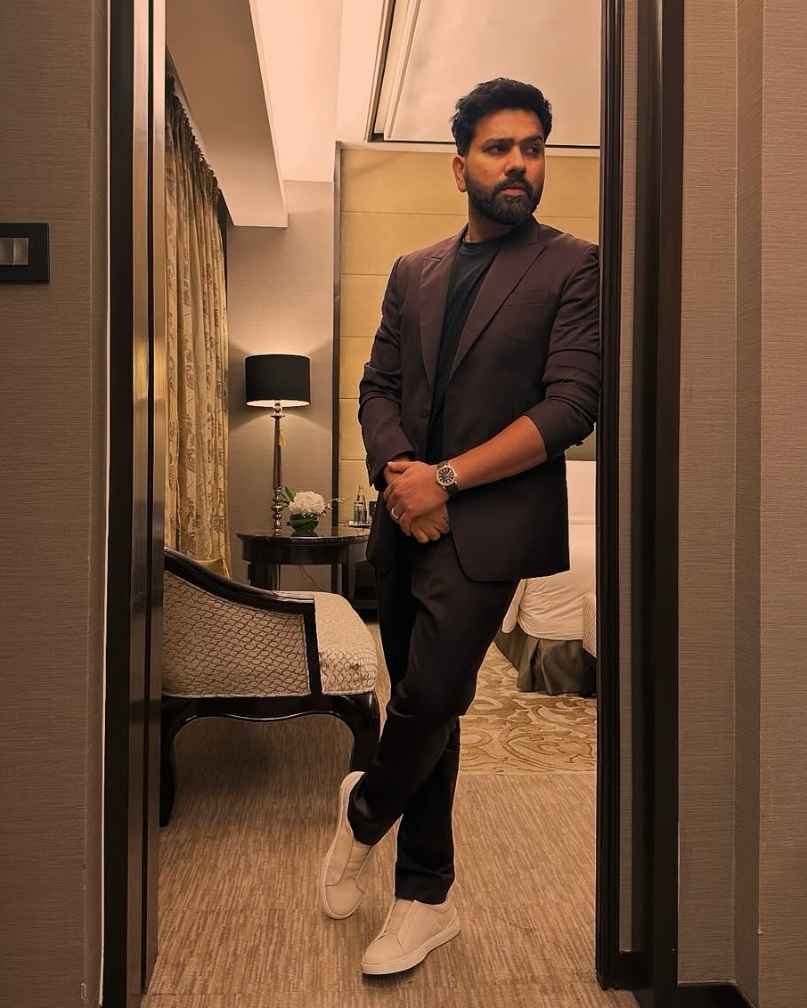 Rohit Sharma is serving serious style goals! 🕴️ The Hitman looked effortlessly classy in his latest formal suit photos, combining elegance with his signature charm. Fans can't stop praising his suave and