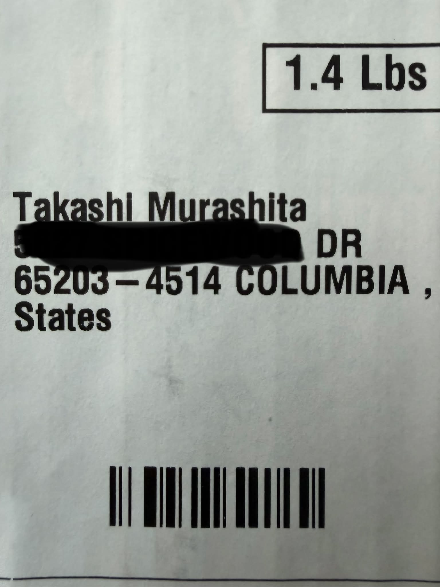 Who is Takashi Murashita and was a package delivered to the wrong