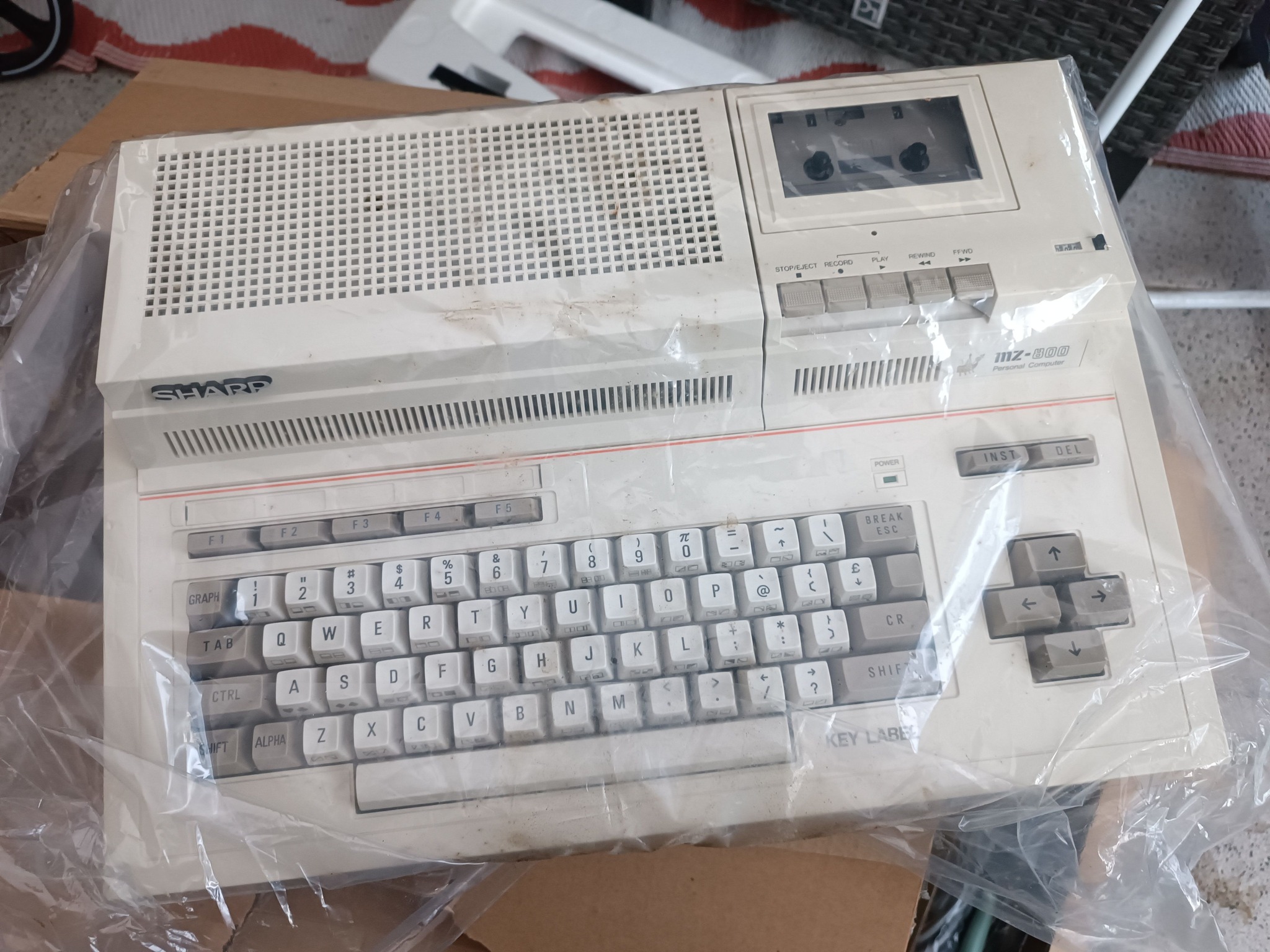 Vintage Sharp PC-1421 computer still in use
