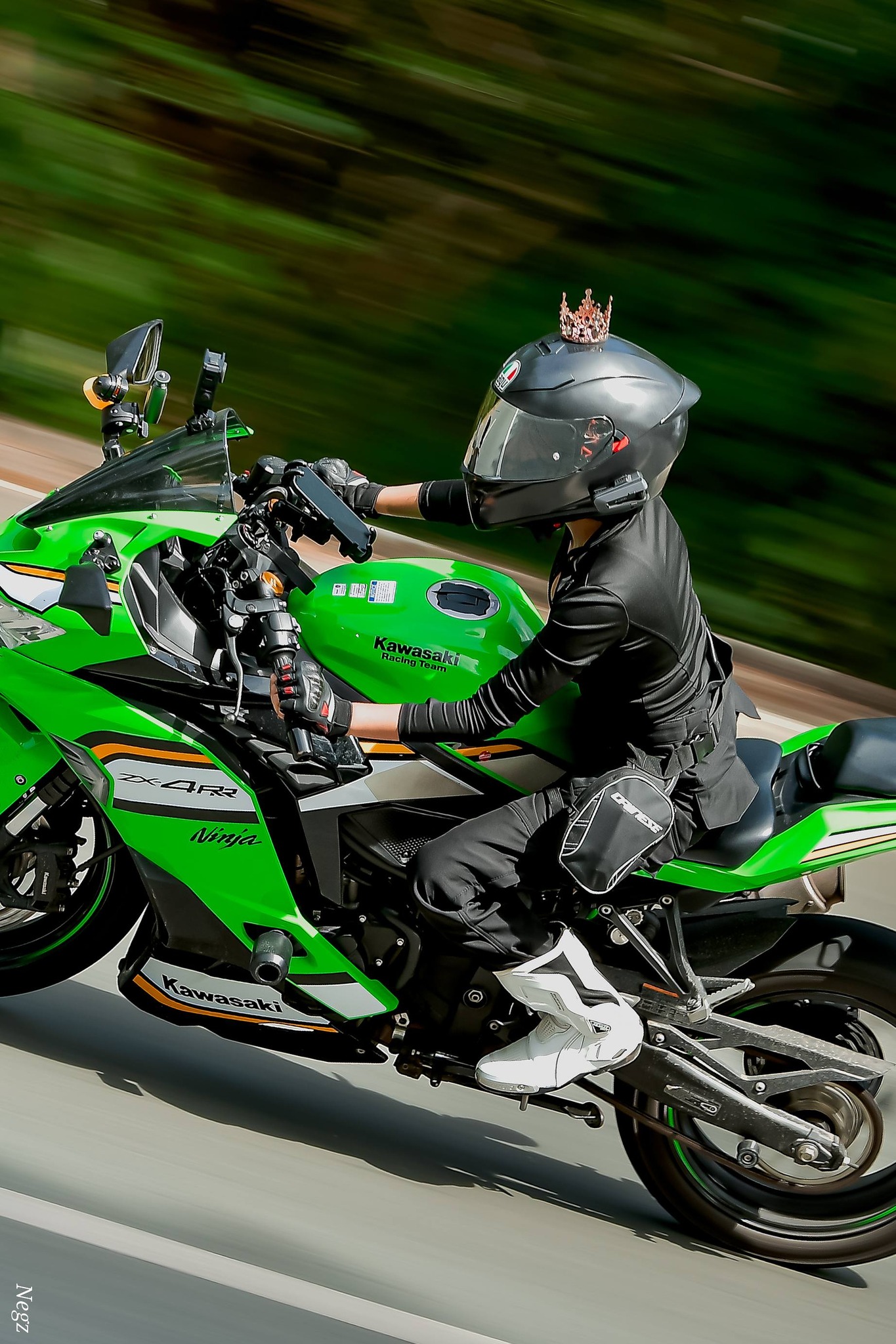 Ms. Kathy Sal rides Kawasaki Ninja ZX4RR