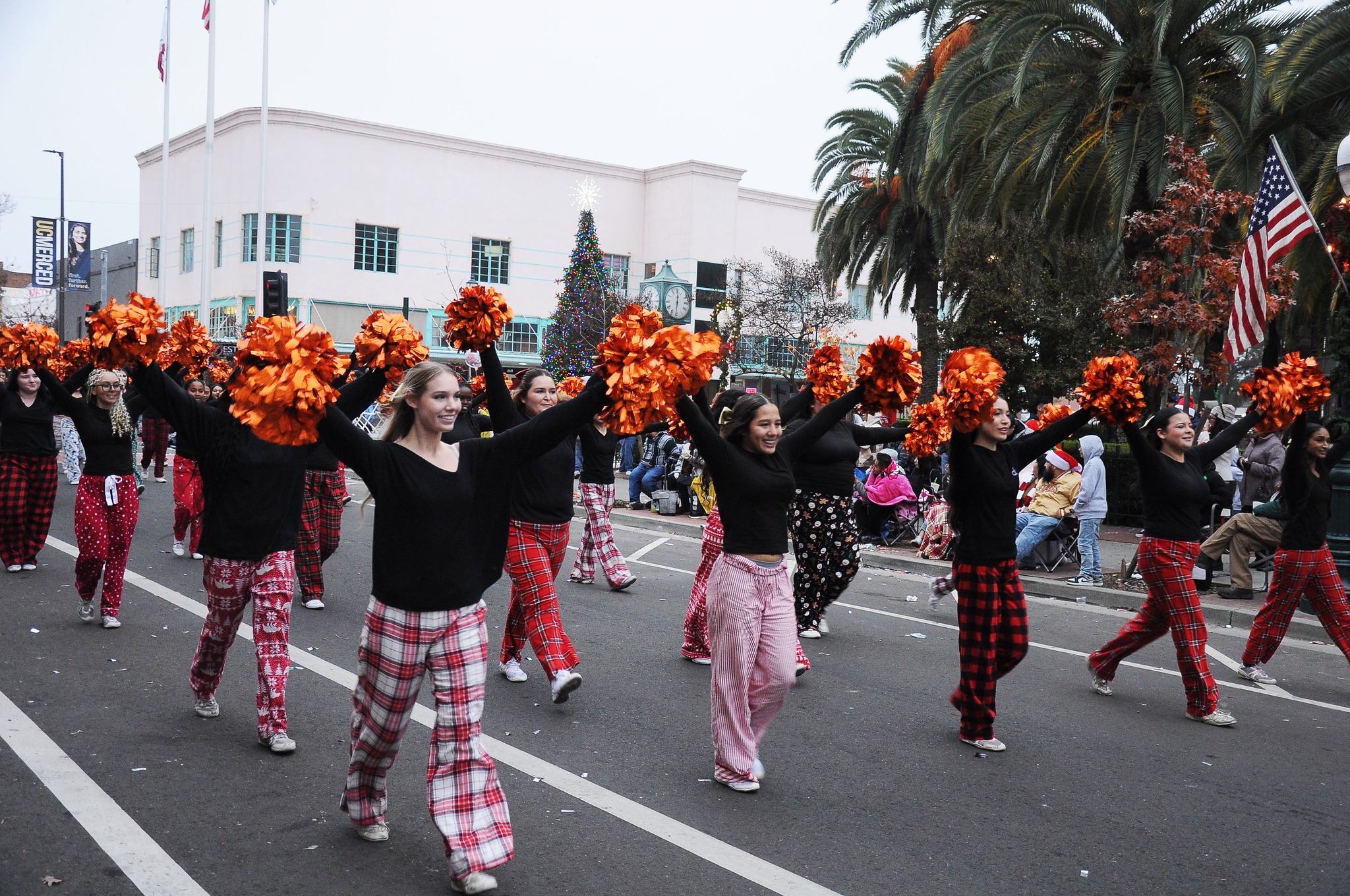 The Merced - Merced High cheerleaders are shown with the Marching 100 ...