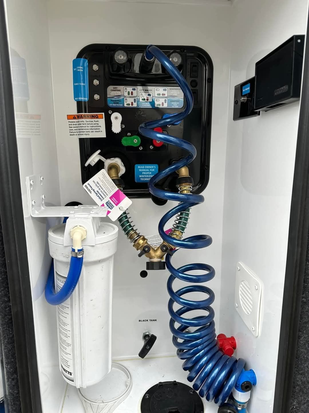 RV - those with the black tank flush and city water inlet close to each ...