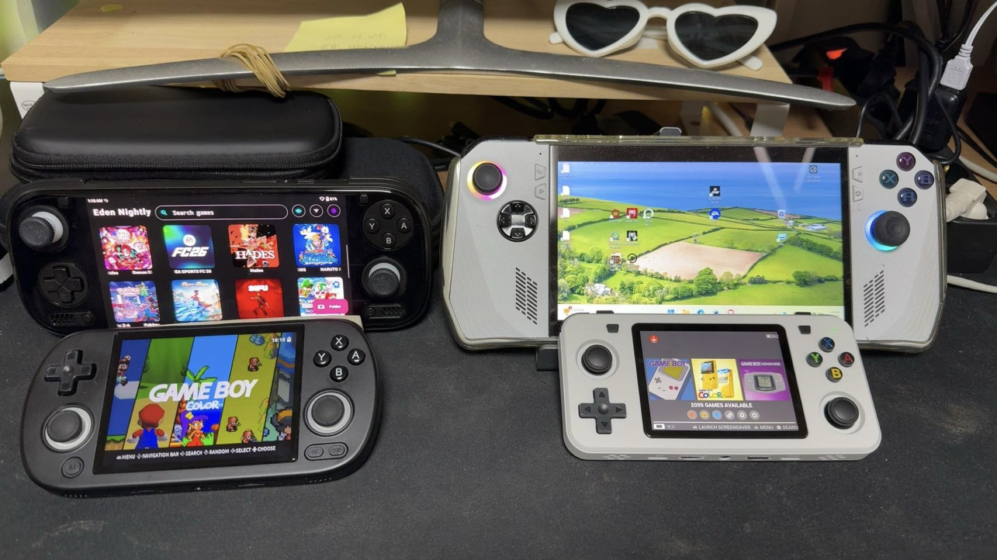 What handheld consoles play PS2, Gamecube, or 3DS games with a