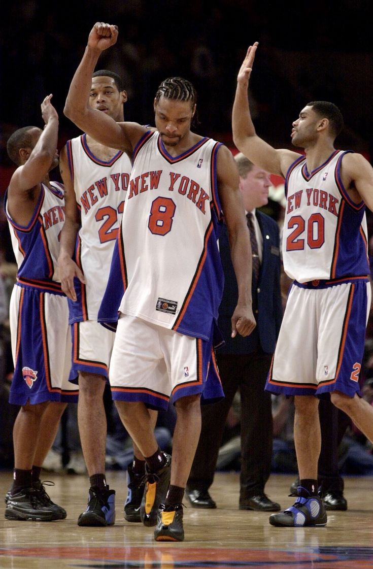 Latrell Sprewell of the New York Knicks waves a towel to the fans