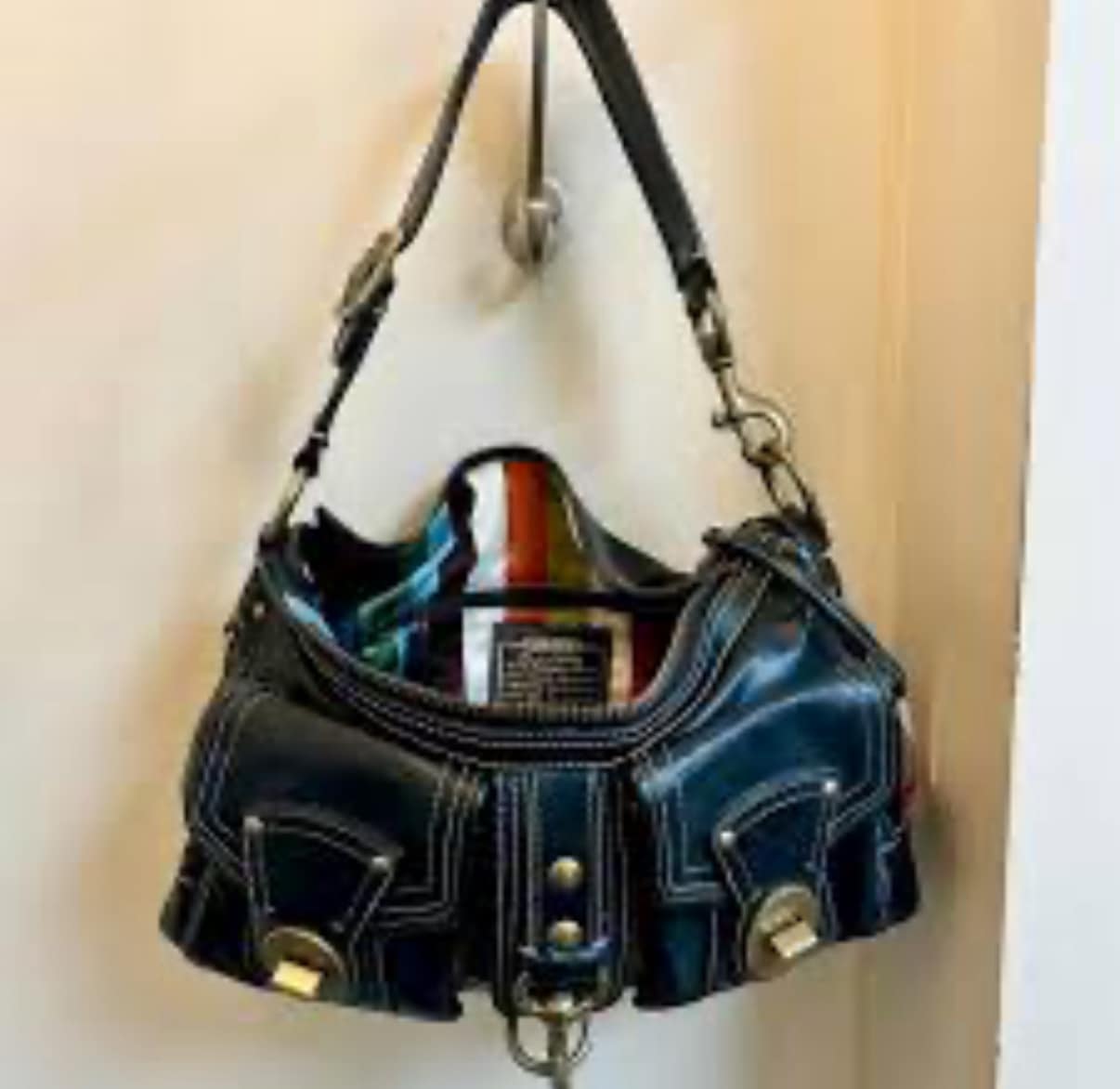Looking for Coach 65th anniversary legacy satchel?