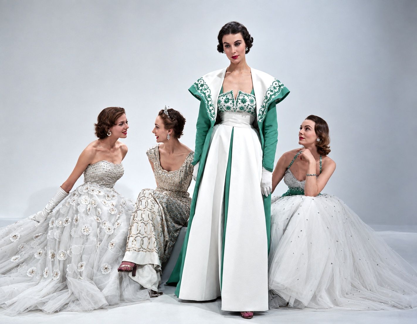 Norman Hartnell evening gowns worn by Enid Boulting, Helen Connor, Myrtle Crawford, and Margaret Phillips in 1953 British Vogue photo by Norman Parkinson