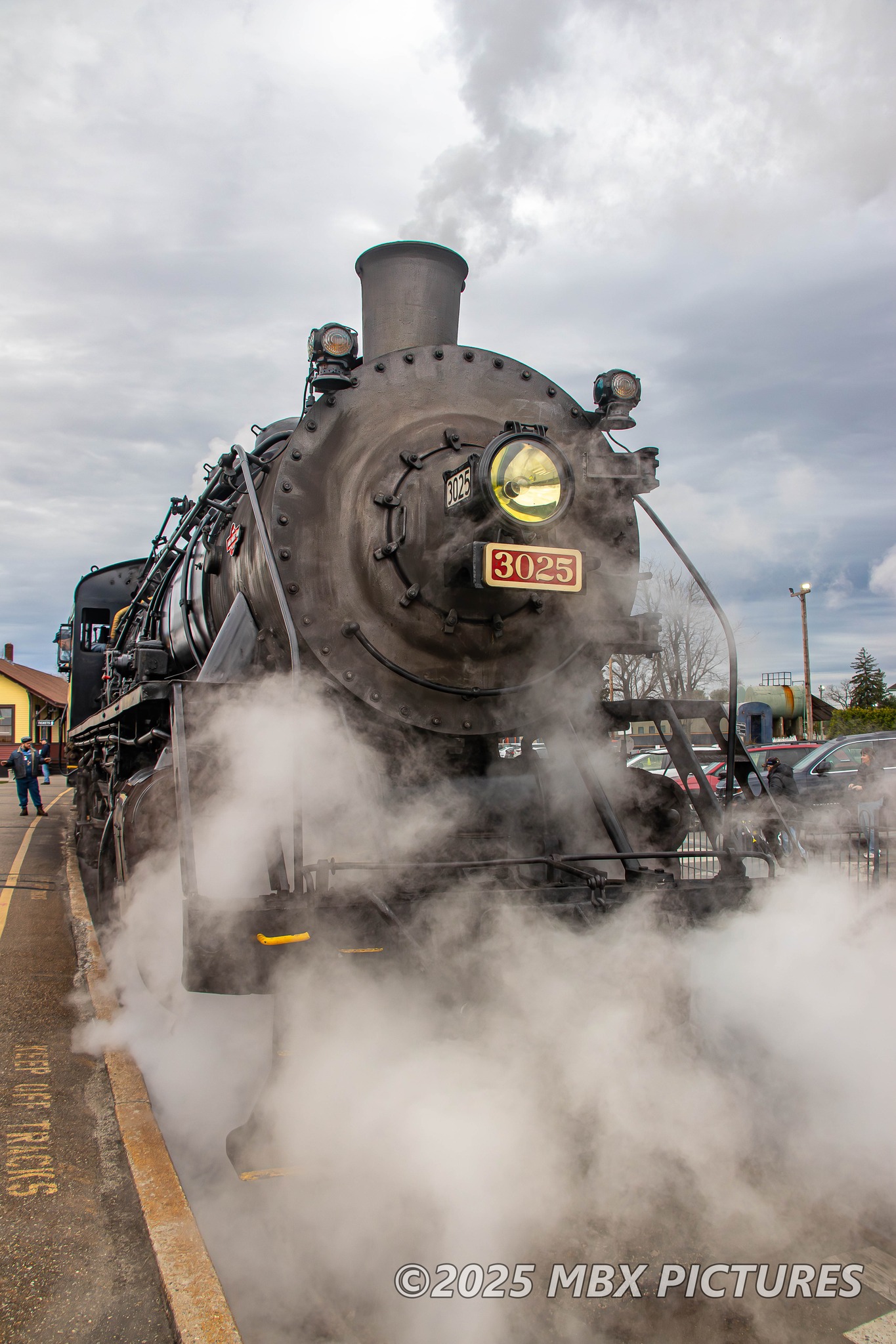 MBX - Steam start. The 3025 has backed onto the train and lets off ...