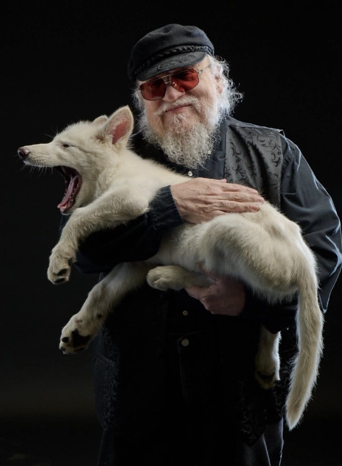 All - George R. R. Martin holding a real living Dire Wolf. George R.R ...