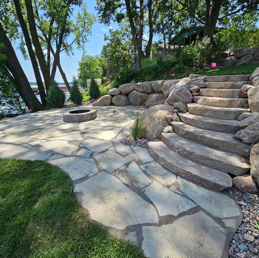 Happy Halloween! The crew wrapped up irrigation, sod, boulder walls ...