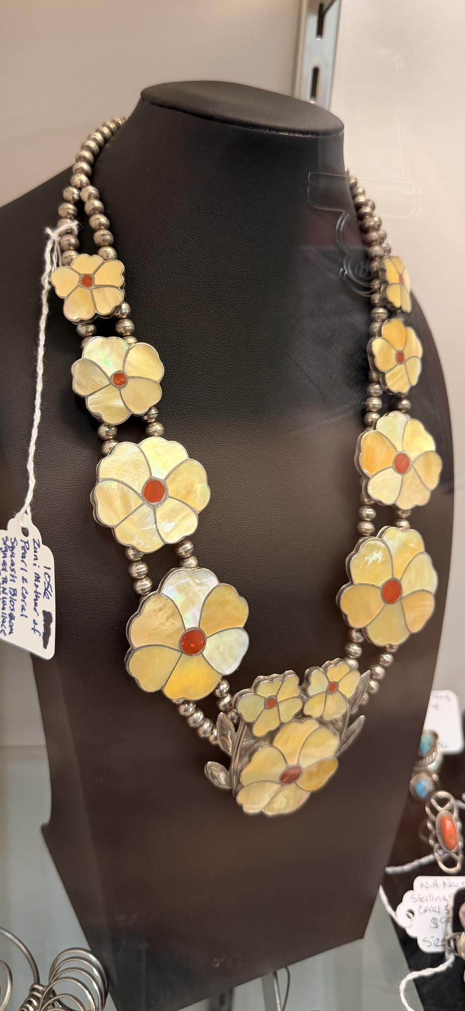 Zuni artist's unique mother of pearl jewelry design