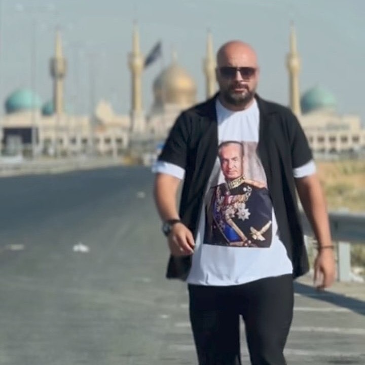 Goldie - Iranian rapper Matin walks away from a mosque while wearing a ...