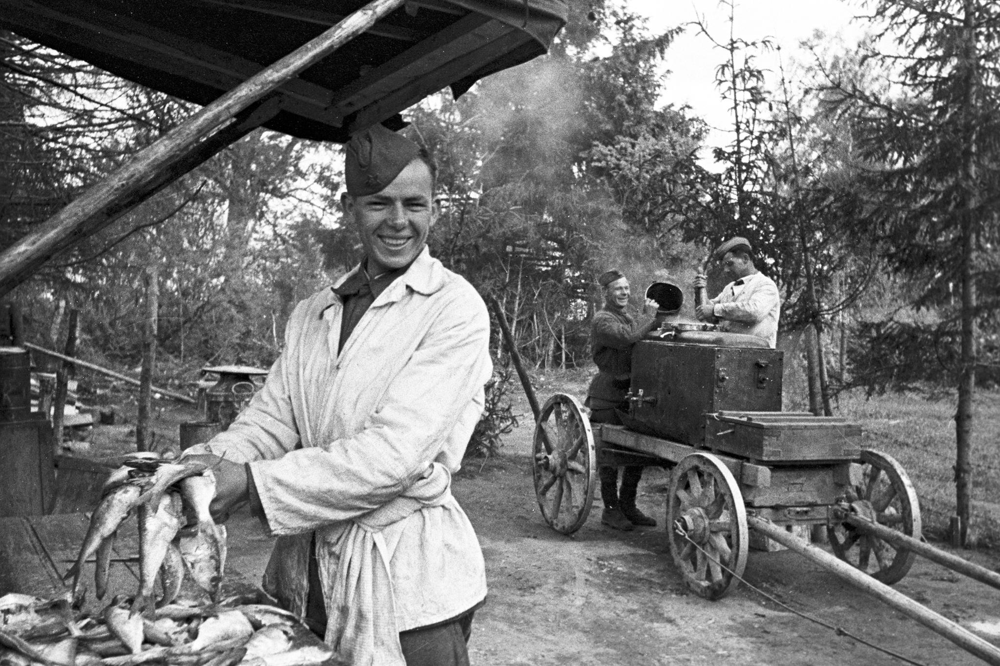 USSR - Cooking lunch in a Soviet field kitchen. Northwestern Front ...