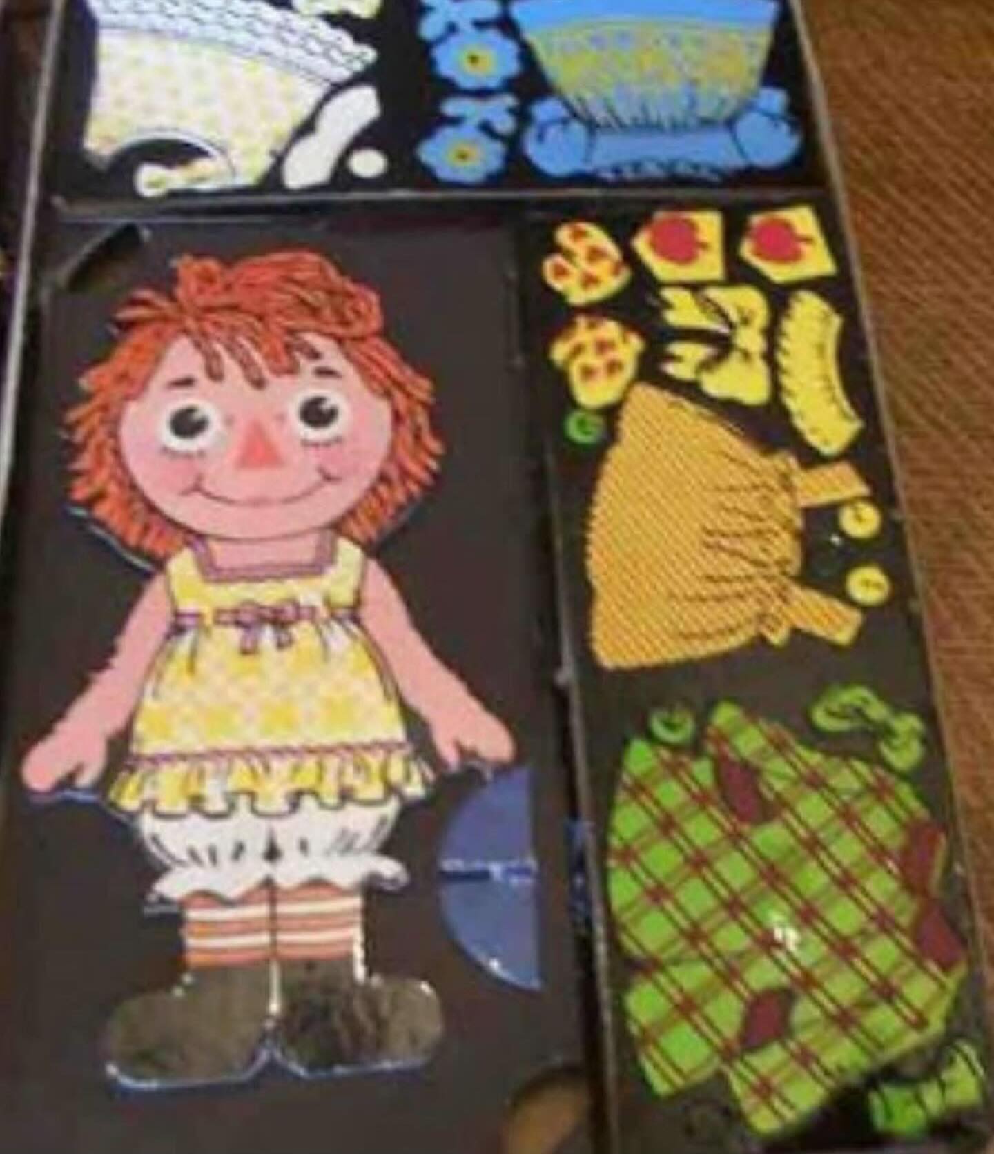 I had this Raggedy Ann Colorform set Dressed her up for years