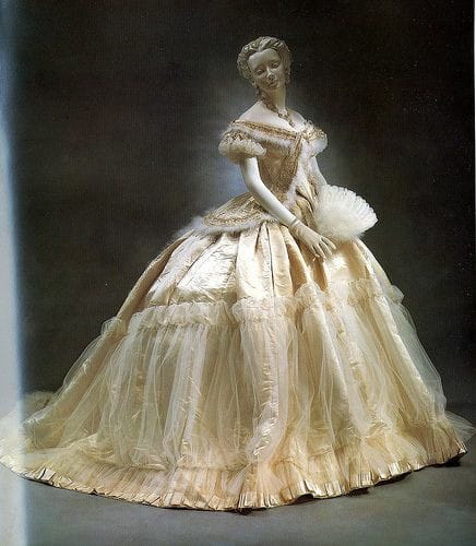 This dress, c 1860, was designed by the House of Worth.