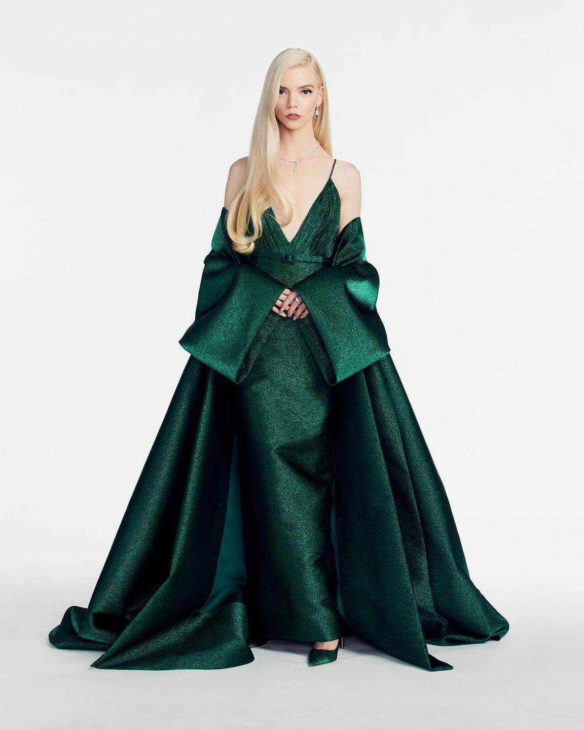 LOOK: Anya Taylor-Joy, winning Best Performance by an Actress in a Television Limited Series for her role in 'The Queen's Gambit', wore a green lurex dress with matching belt and evening coat