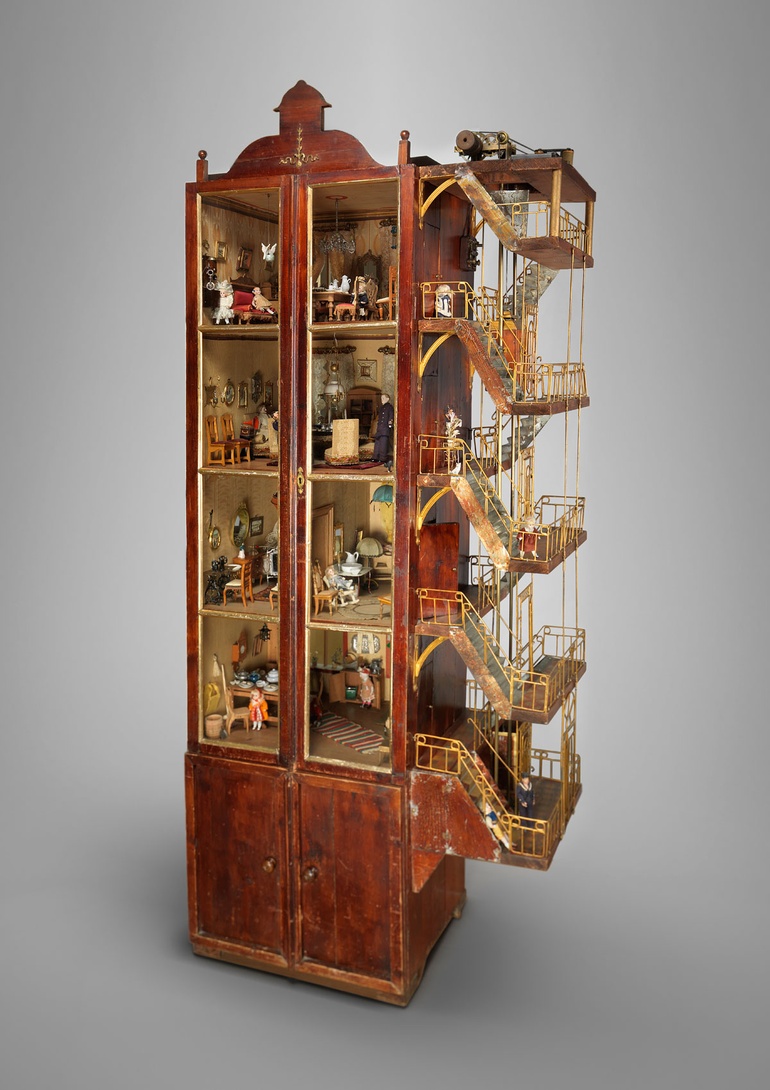 Four story dollhouse built in 1912 with elevator and electric