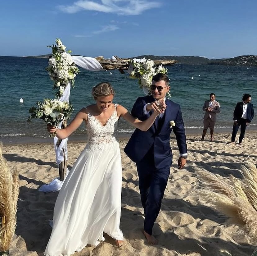 Barefoot on the beach and bespoke on the back 🐚🌊 We had the honour of dressing this groom for his seaside wedding