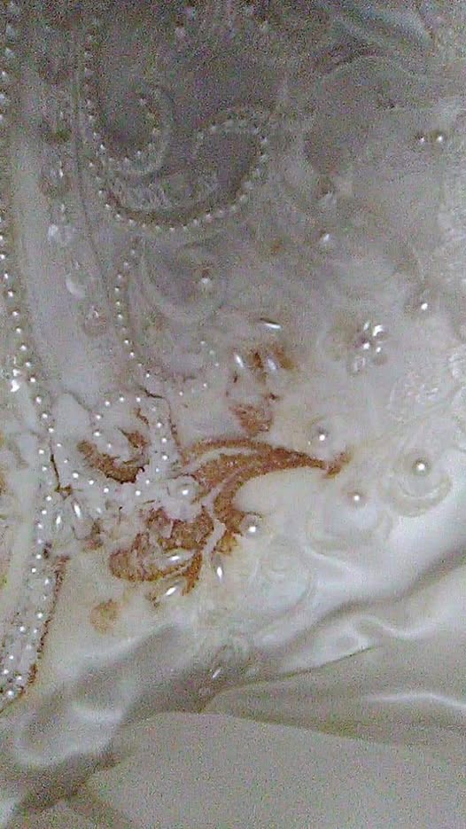 How to remove coffee stains from wedding dress embroidery?