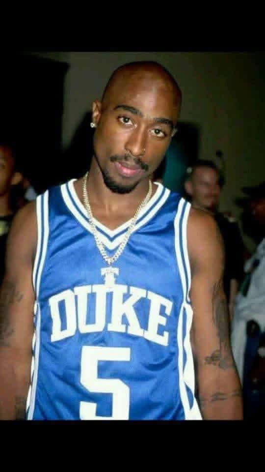 Tupac Shakur rocking the #Duke jersey. 💯