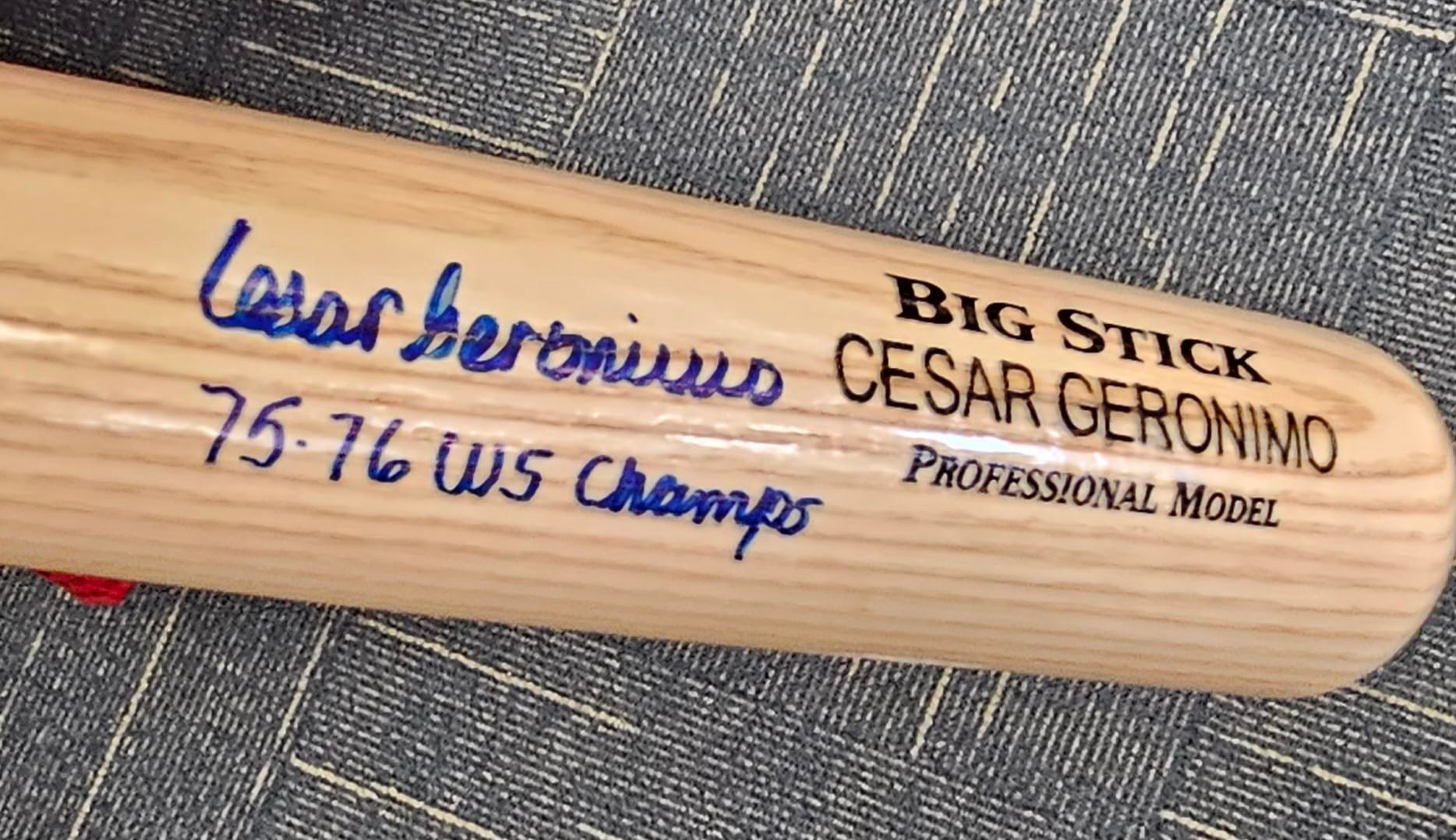 Cesar Geronimo signed bat with 75-76 WS champs inscription