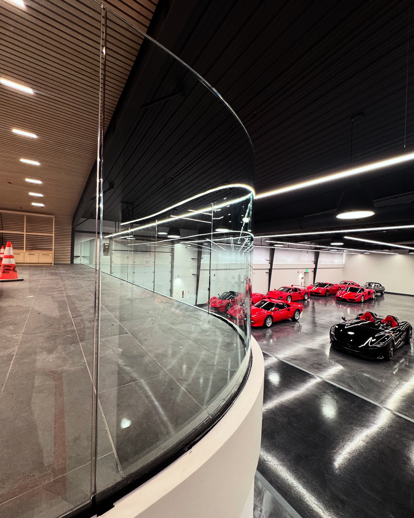 Brisk - Curved all-glass railings installed at a private car collection ...