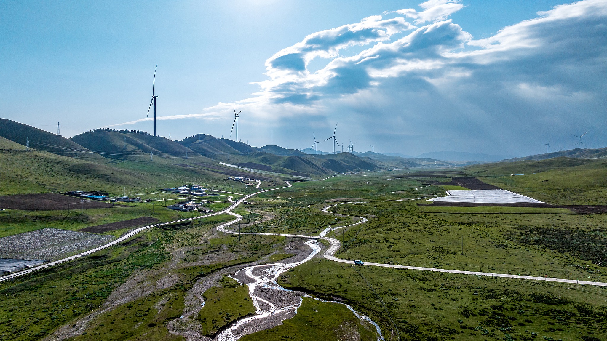 Global Times - 【InPics】On June 14, rows of wind turbines... | Facebook