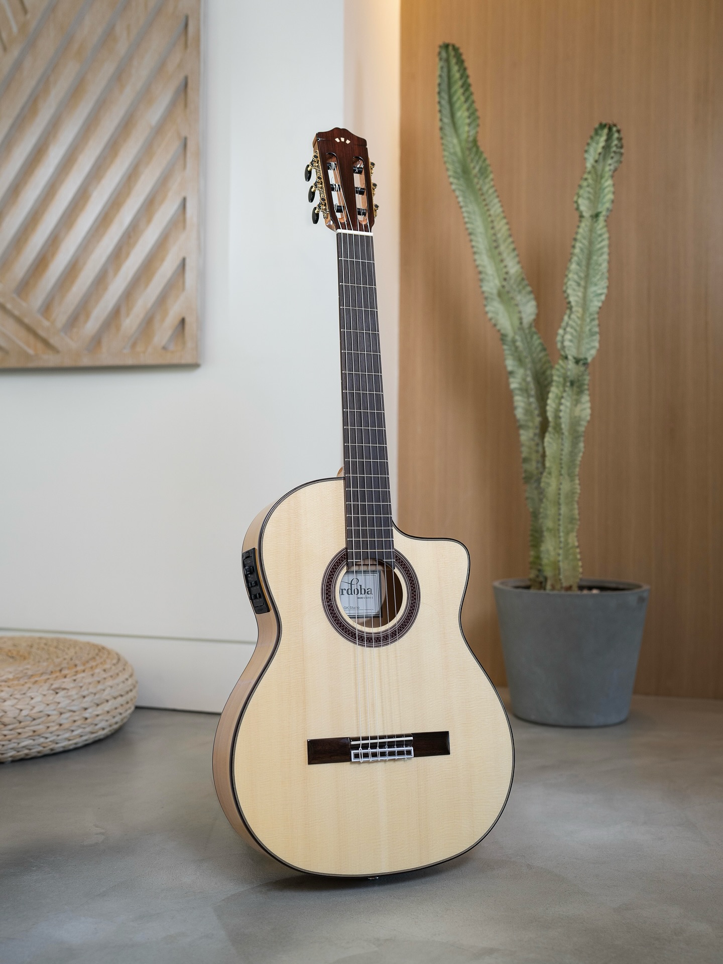 With a solid European spruce top complementing a laminated cypress 