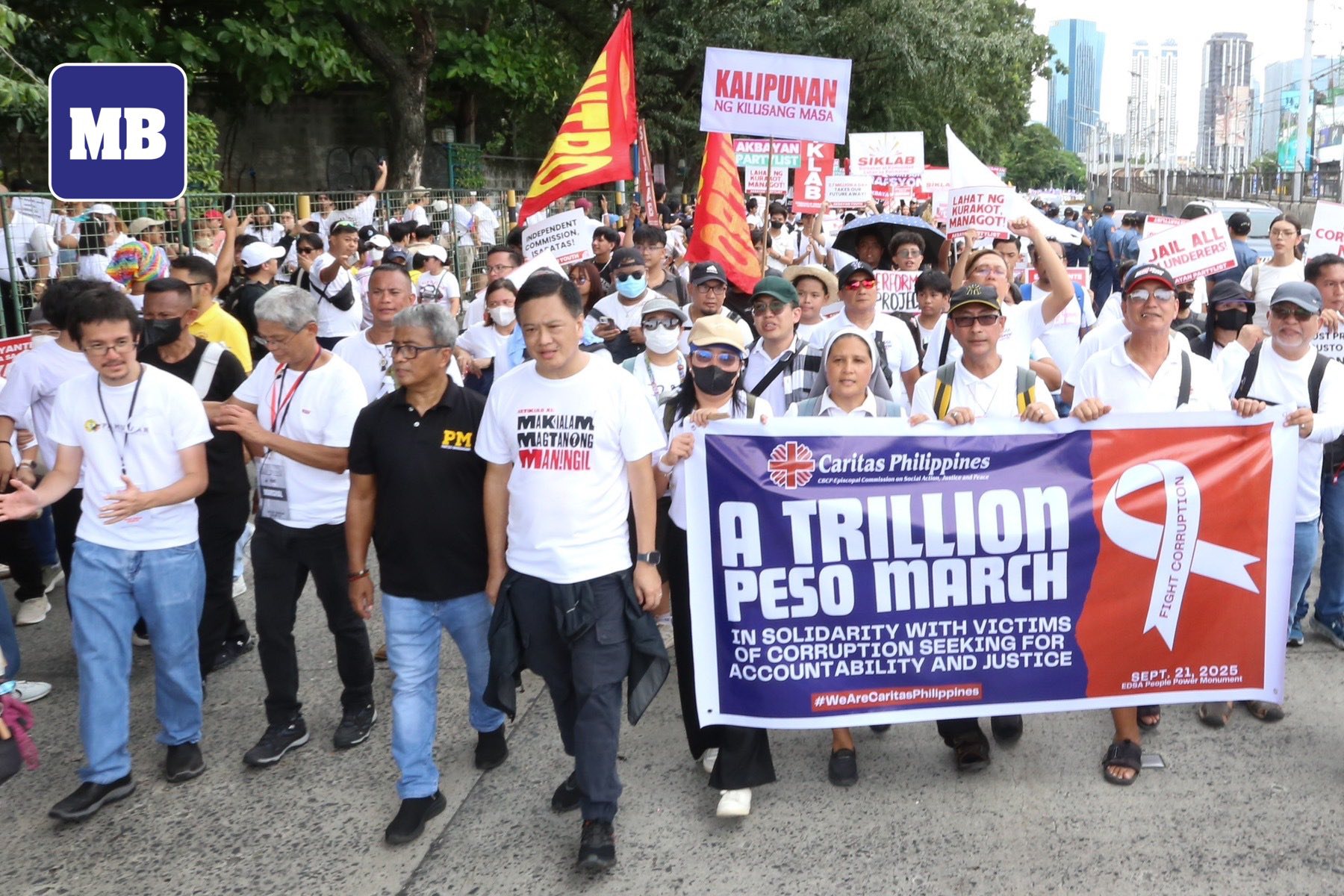 MANILA - Thousands of protesters march towards the EDSA People Power ...