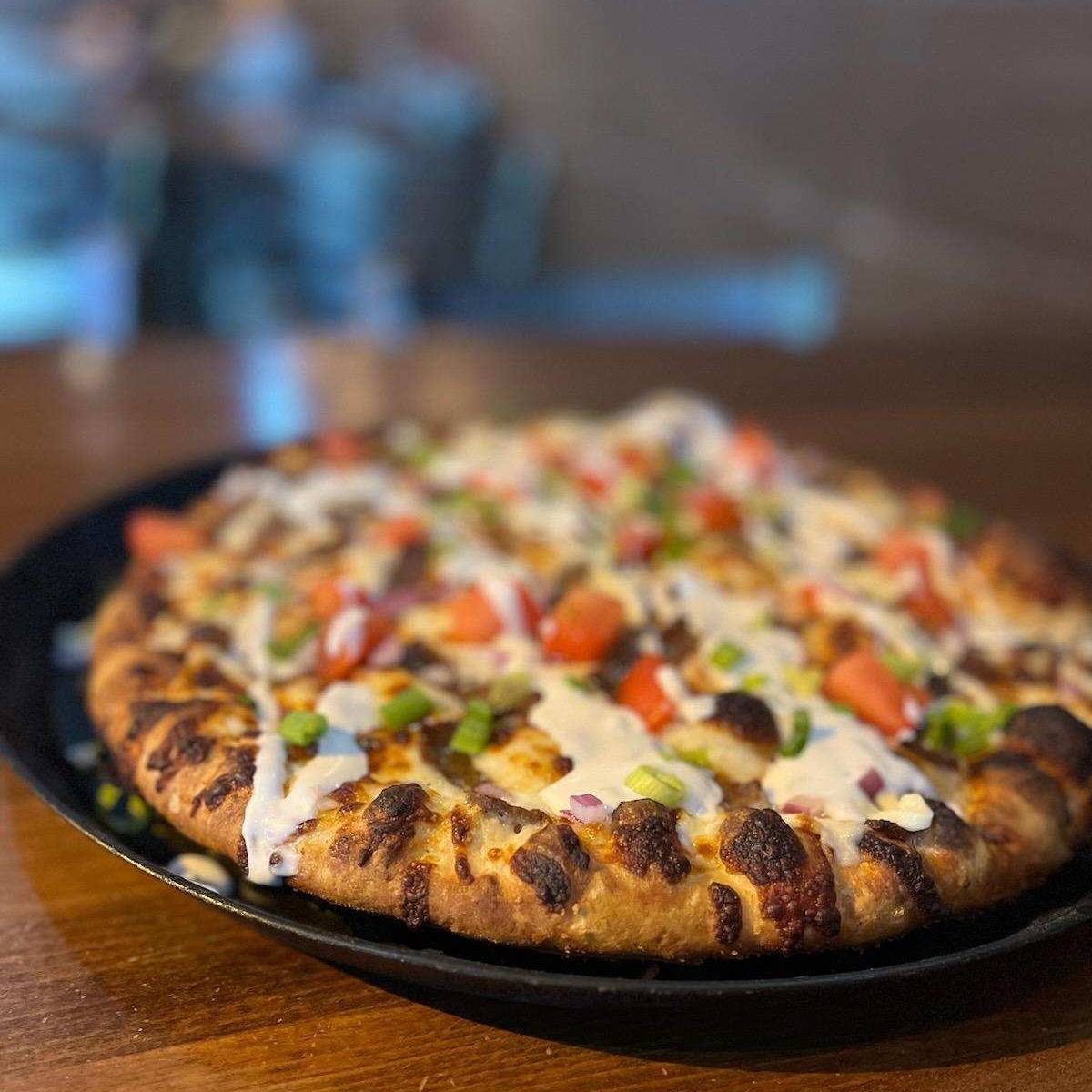 NEW JULY PIZZA OF THE... - Timber Creek Pizza Pub & Grill