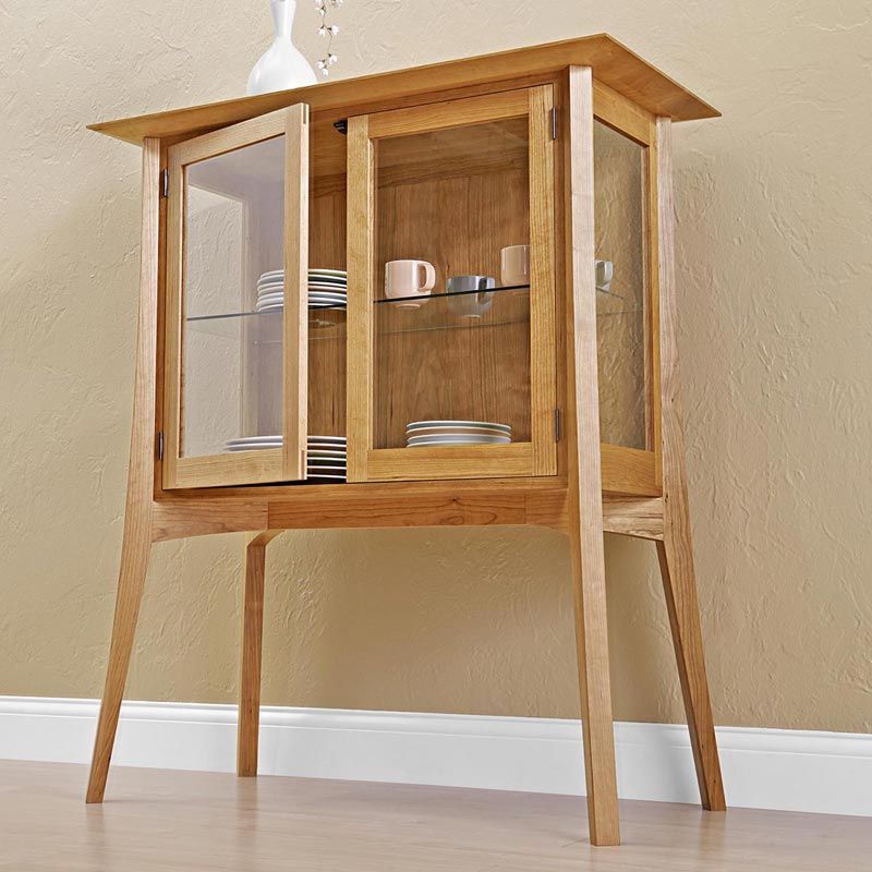WOOD - Curved legs and lithe lines combine to give this hutch a ...