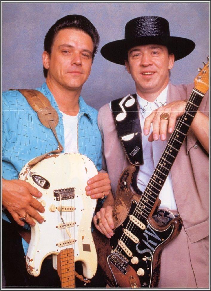 1990 photograph of Eric Clapton, Stevie Ray Vaughan and Robert