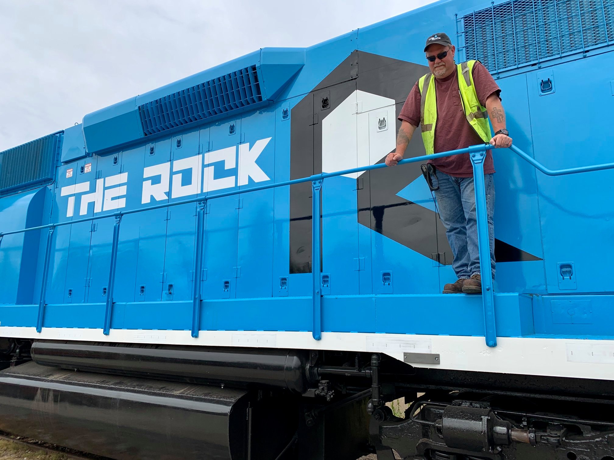 Rock - Robert J. Riley, President and CEO, poses with Rock Island no ...