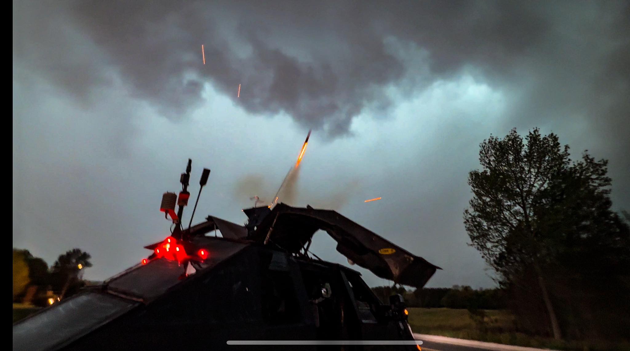 Dominator rocket launch into rain-wrapped tornado near New Albany