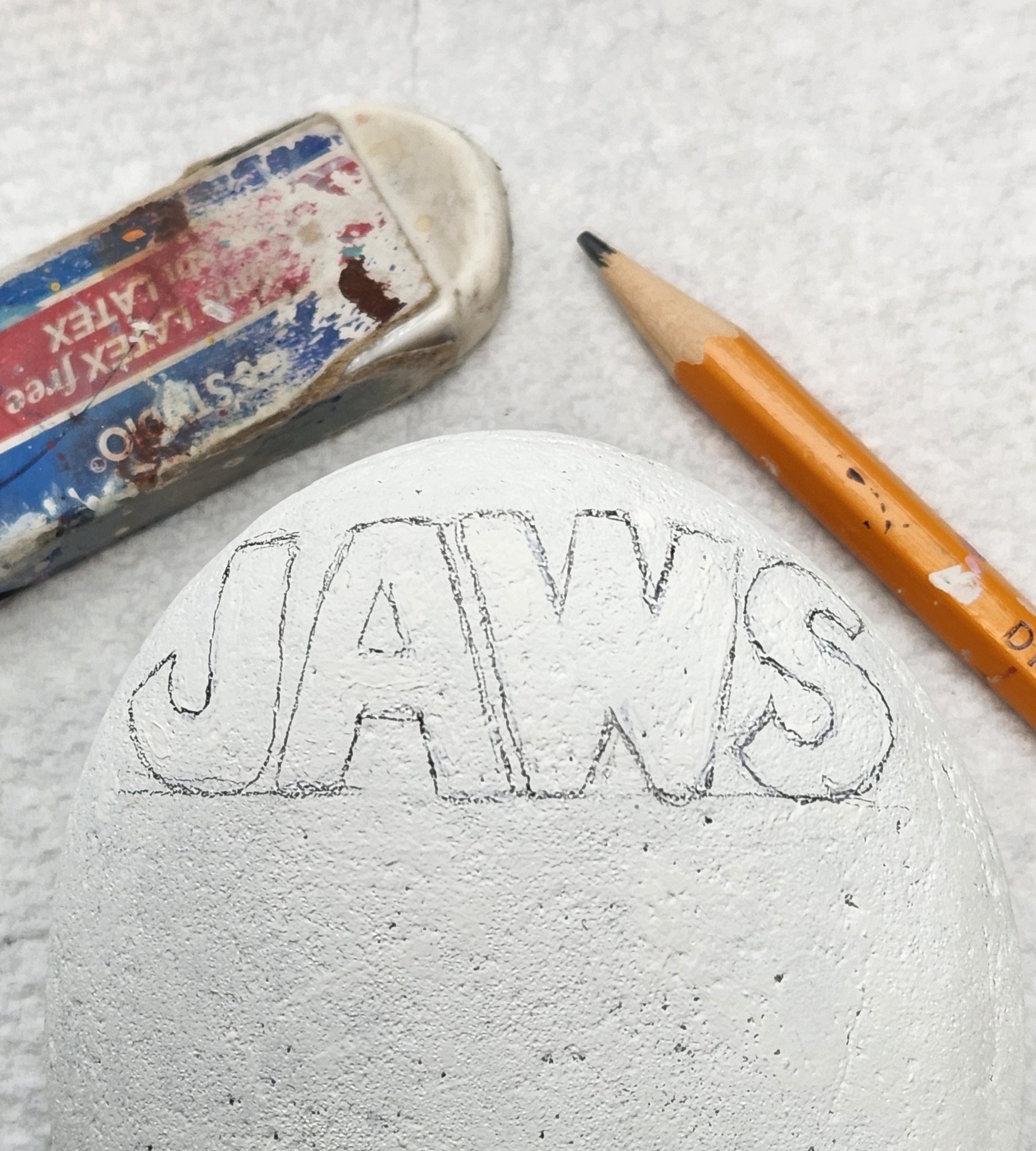 Rocan - Start by drawing in the lettering across the top. -I like to ...