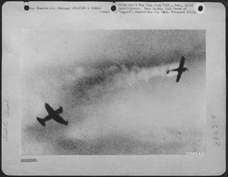 An enhanced and colorized still-shot from a P-47 gun camera during
