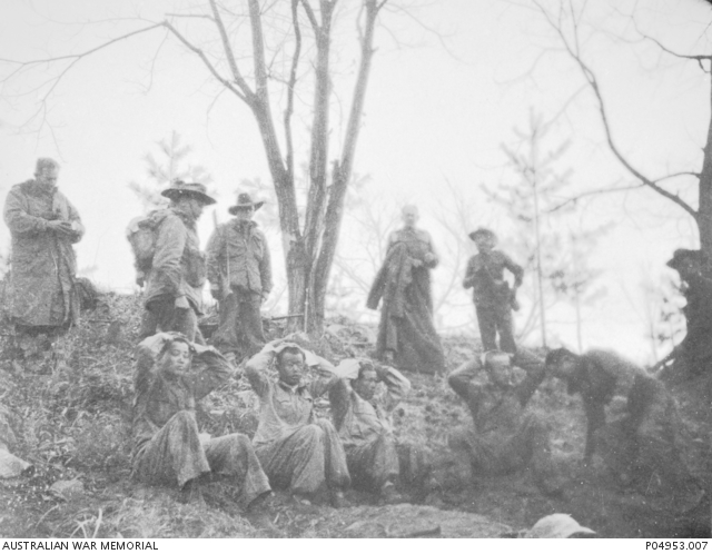 Regimental - Captured at Kapyong! A line of Chinese soldiers kneeling ...