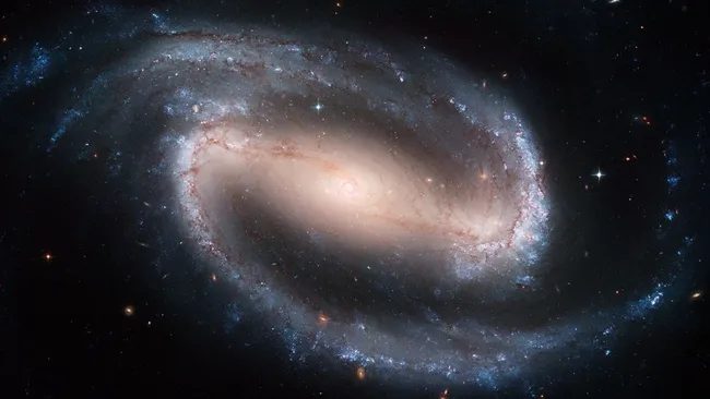 LiveScience - Astronomers have confirmed the earliest barred spiral ...