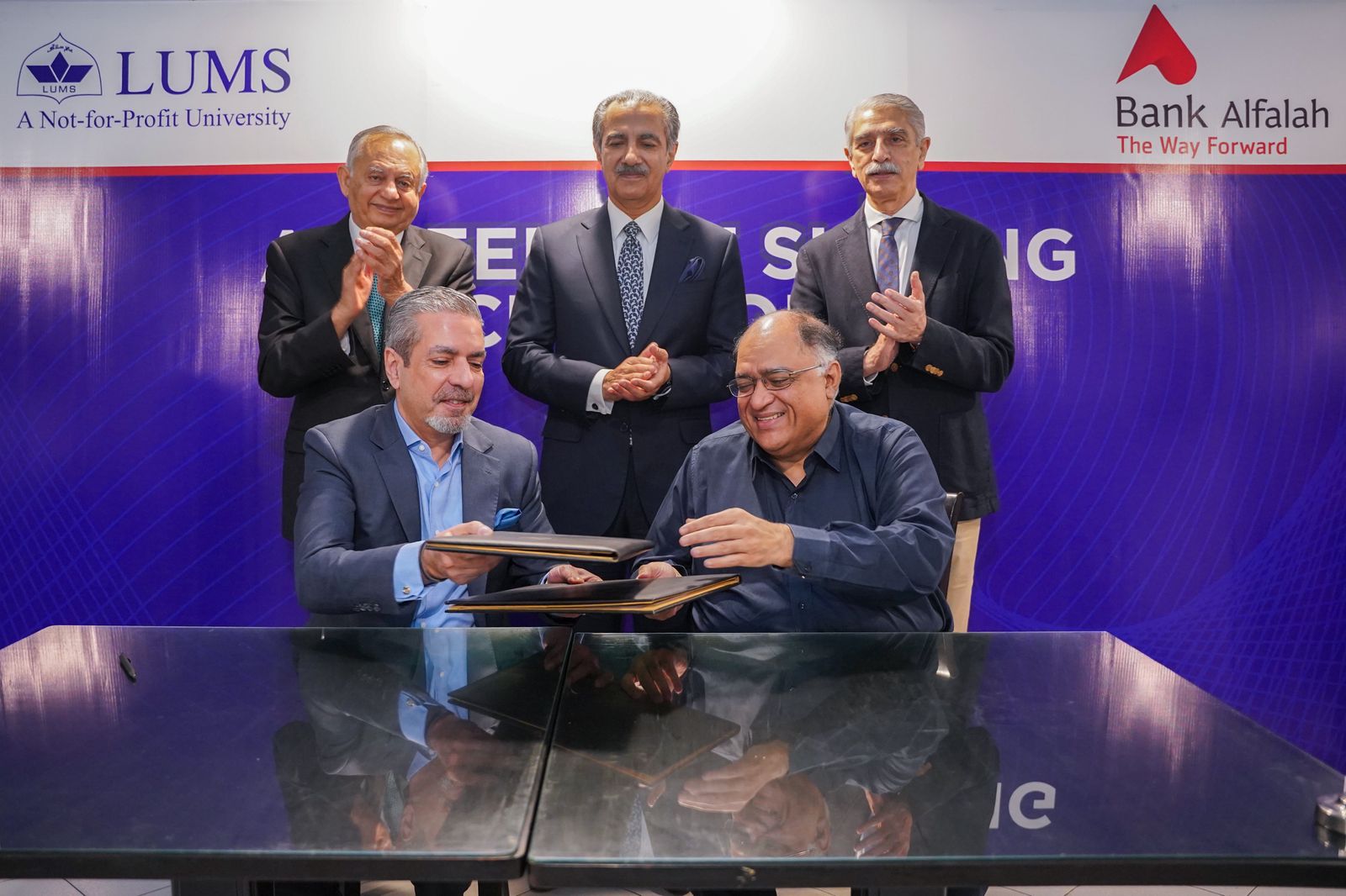 LUMS - An MoU was signed by Mr. Faisal Farooq Khan, Chief Human ...