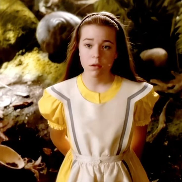 alice in wonderland brown hair yellow dress a world where stays, Underland becomes her permanent kingdom 👑 Tim Burton's original vision reportedly had Alice choosing her chosen family over her Victorian obligations but Disney pushed for the 