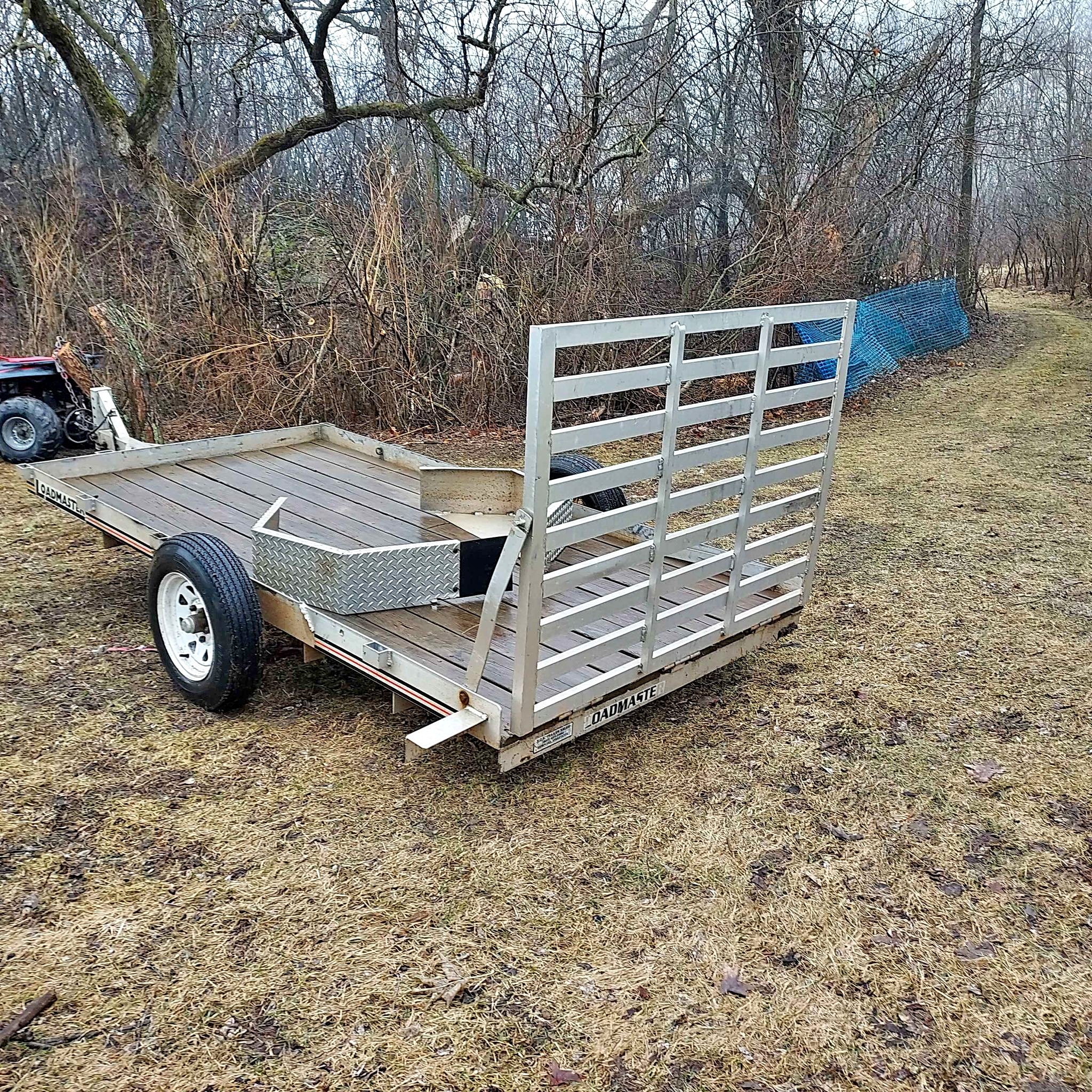 Loadmaster Utility Trailer with Ramp. Wood bed 5 x 10. single axel ...