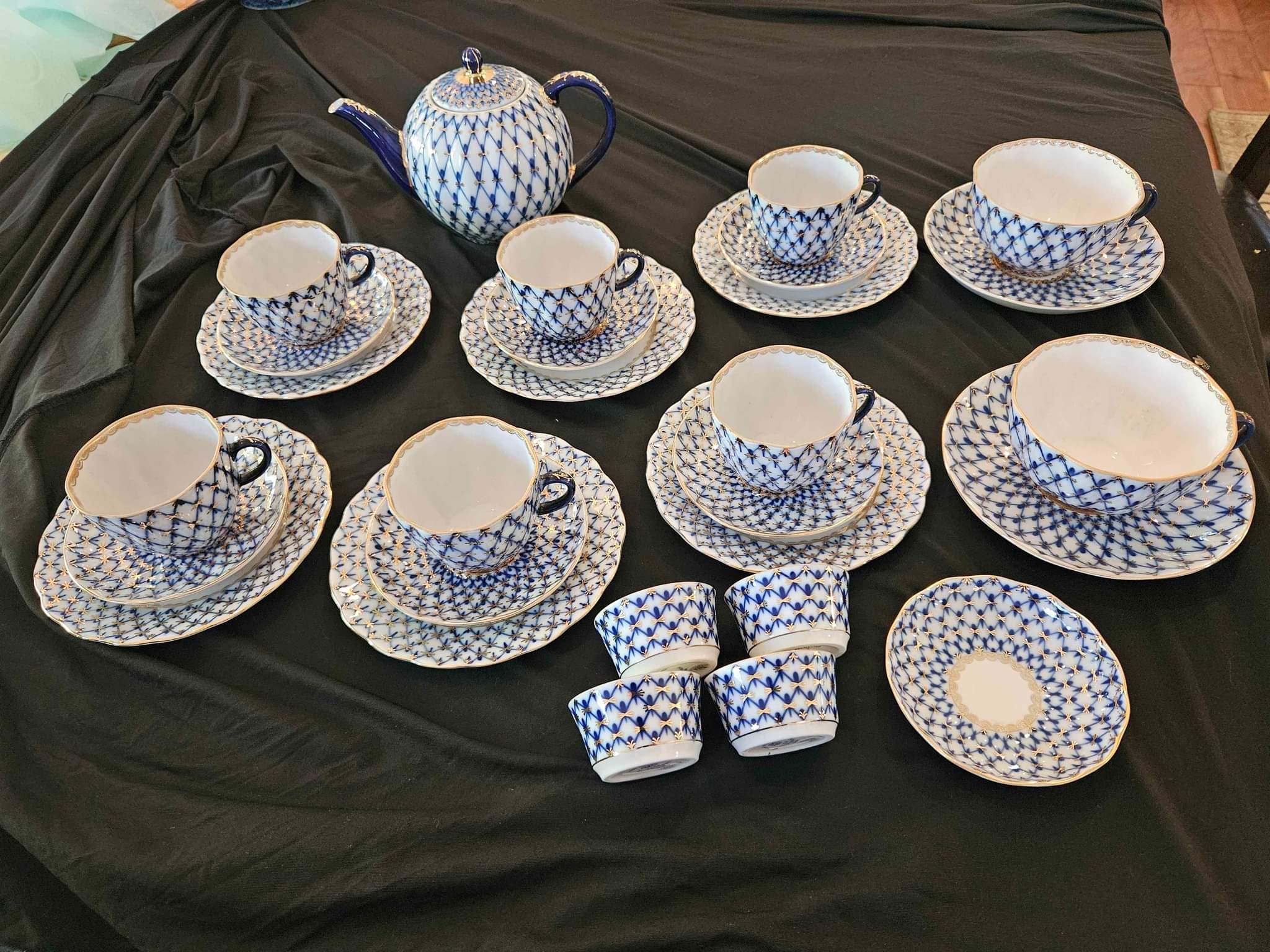 This is a highly unique and sought-after Russian tea set 'Blue Net