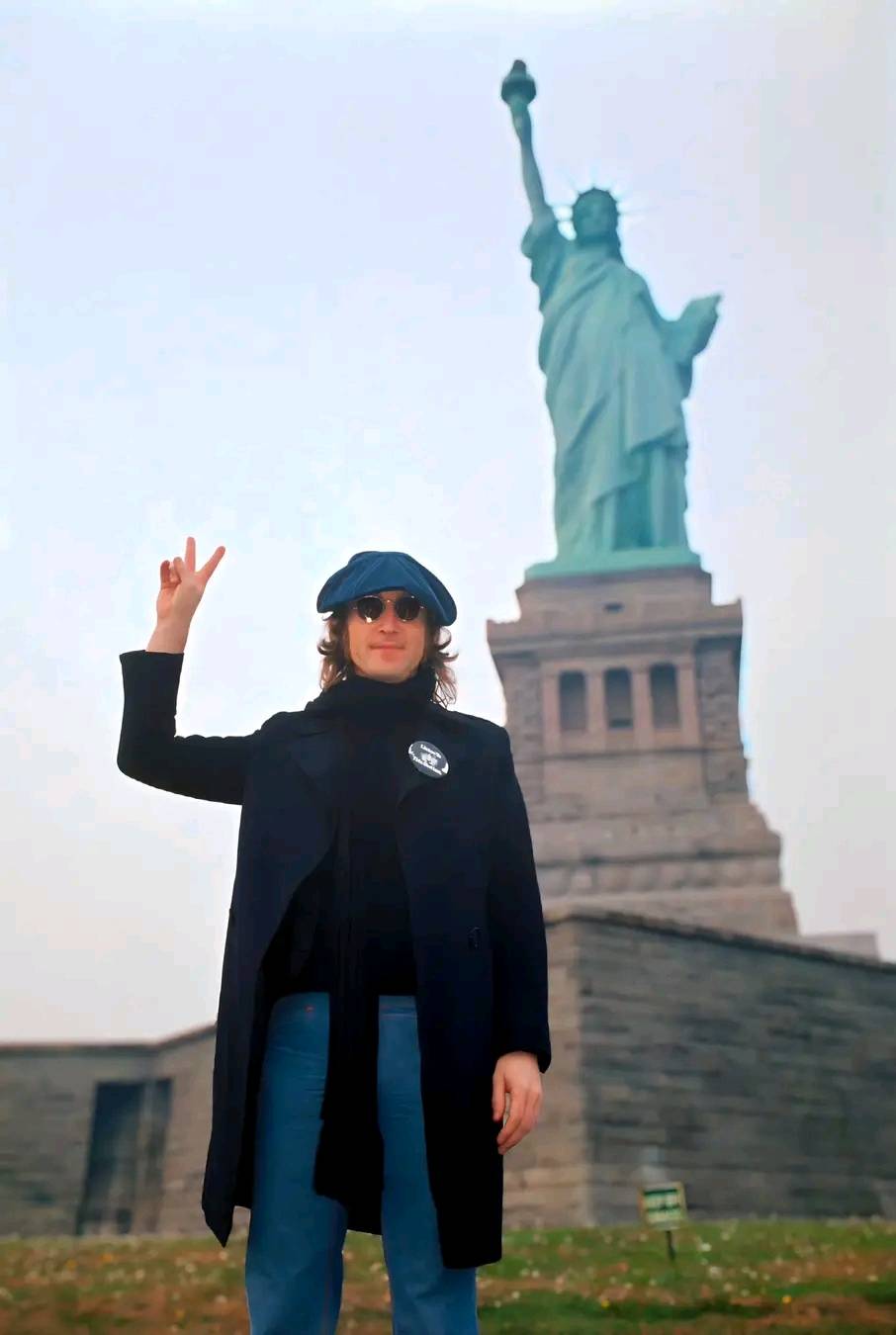 John Lennon in front of The Statue of Liberty, NYC, 1974. Photo by