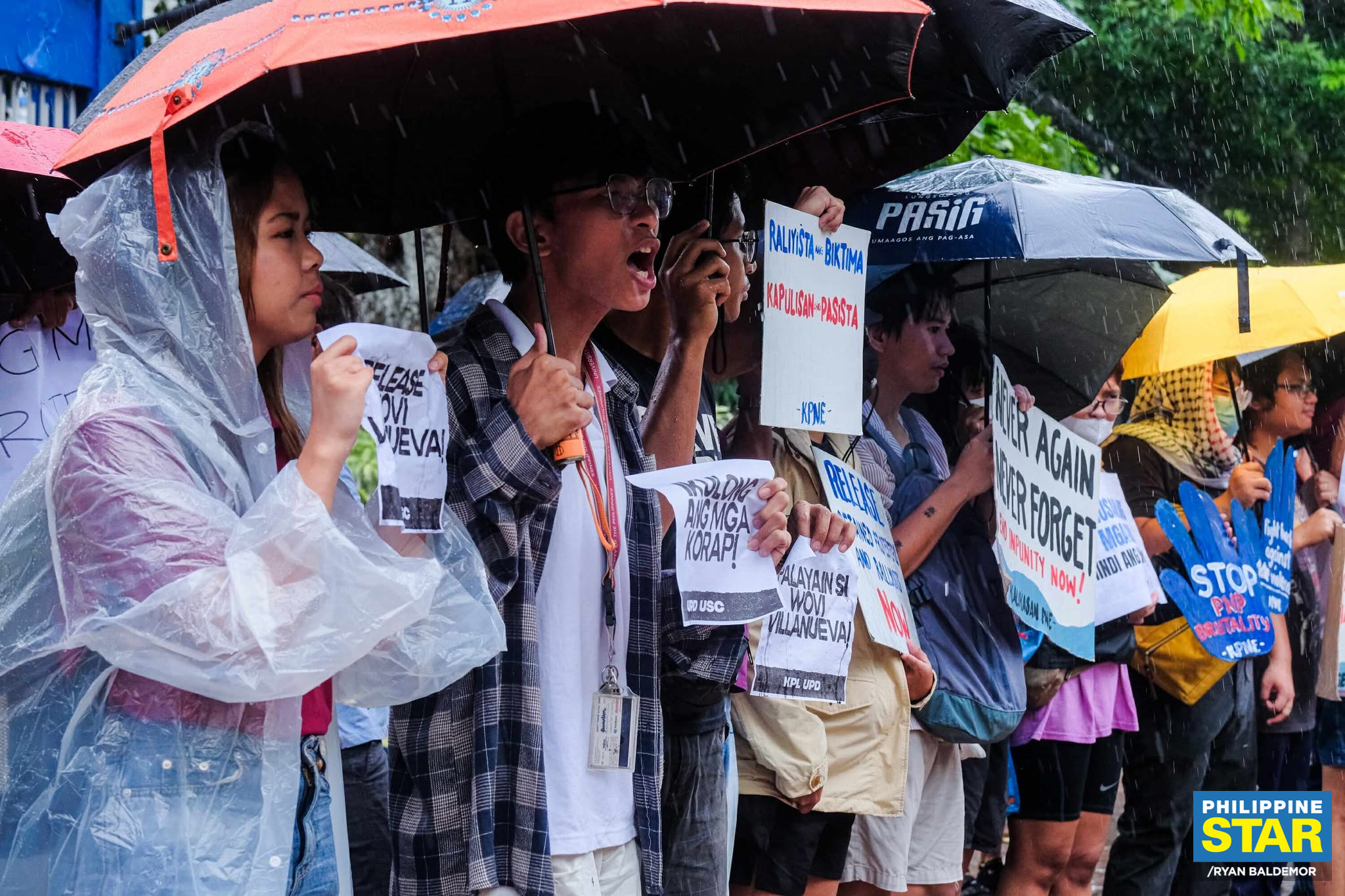 Philippine - Young activists stage a protest outside the Manila Police ...