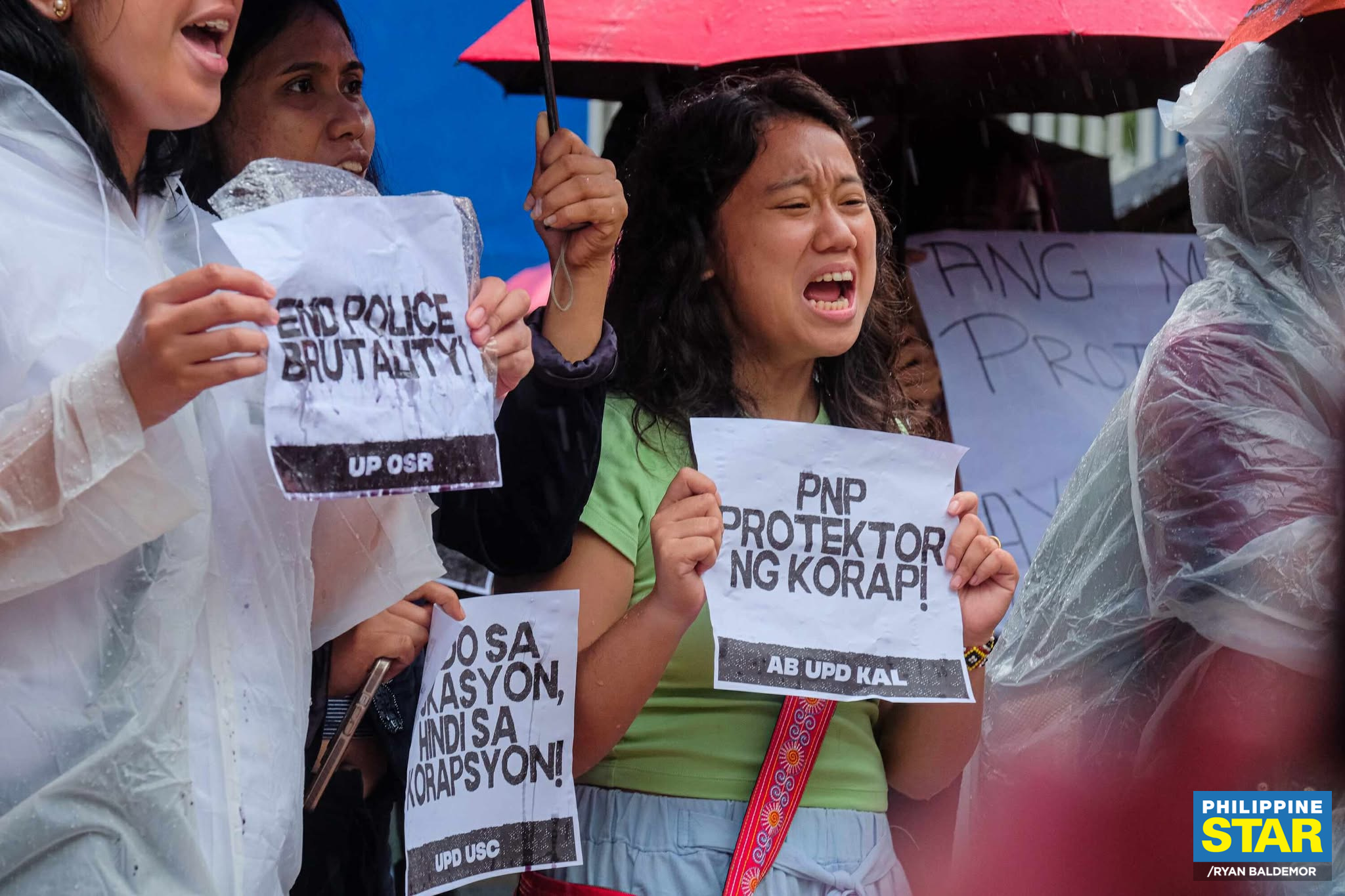 Philippine - Young activists stage a protest outside the Manila Police ...