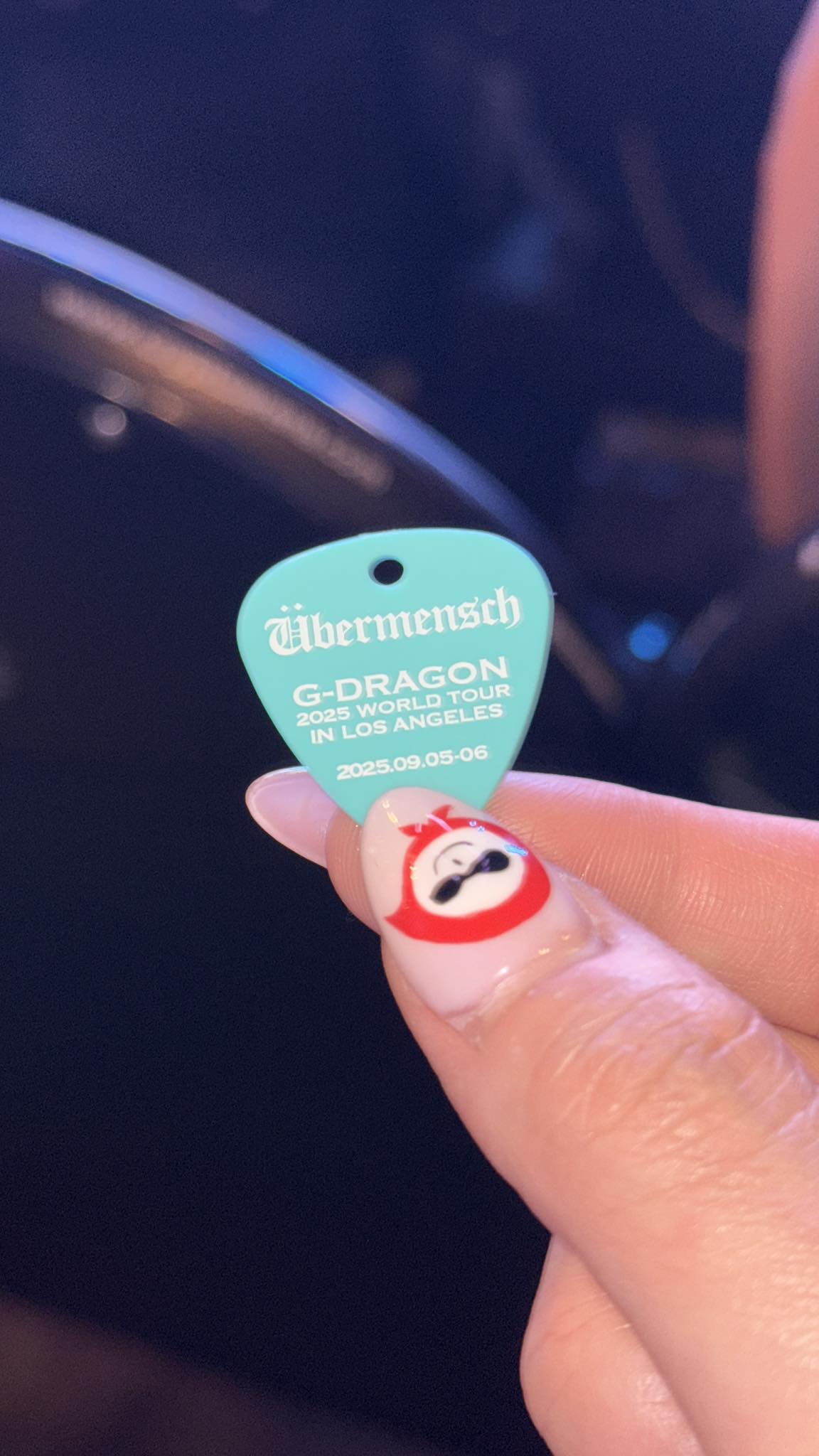 G-Dragon fan looking to trade LA guitar pick in Asia
