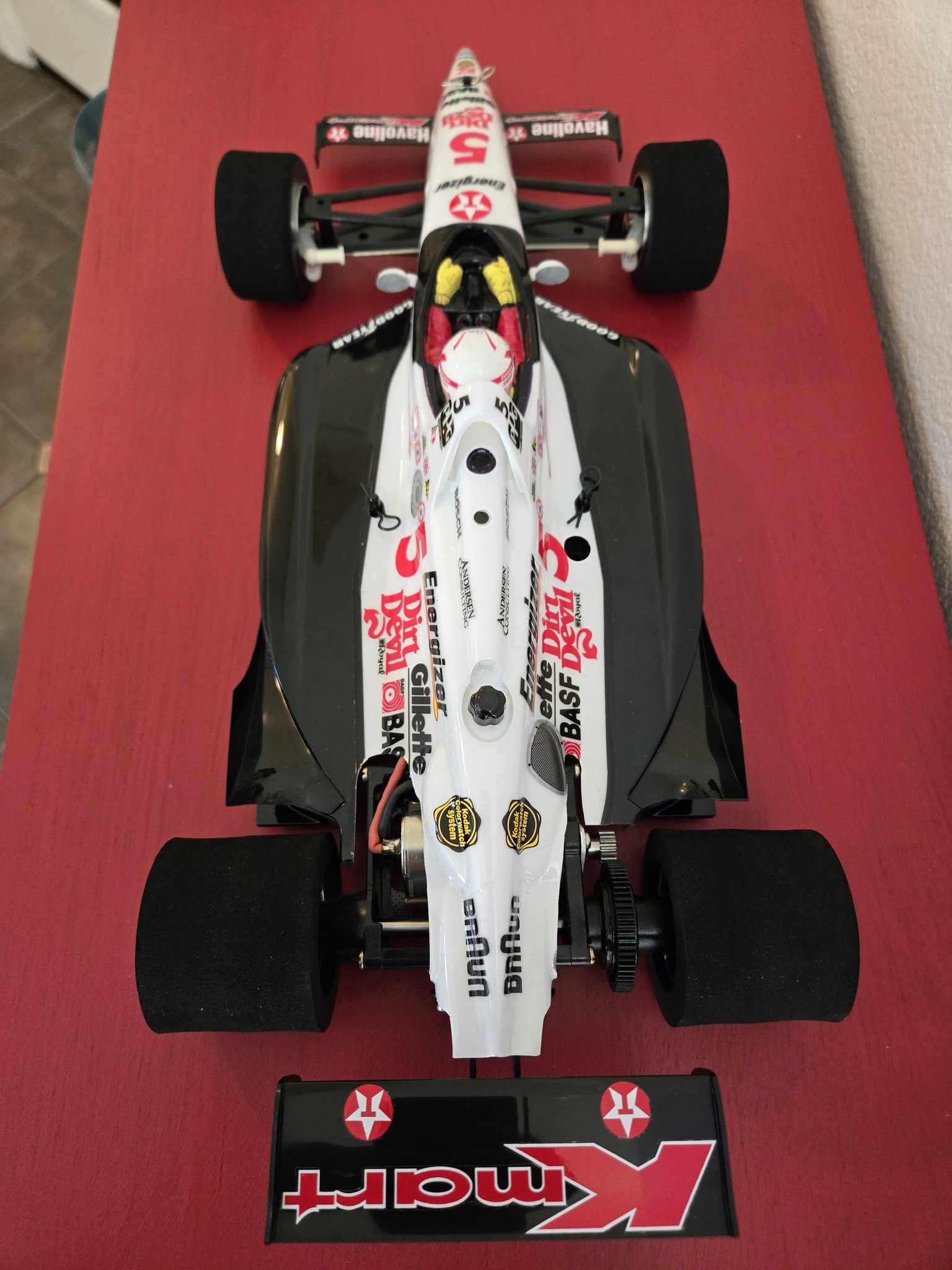 Tamiya Lola T93/00 model with custom driver figure